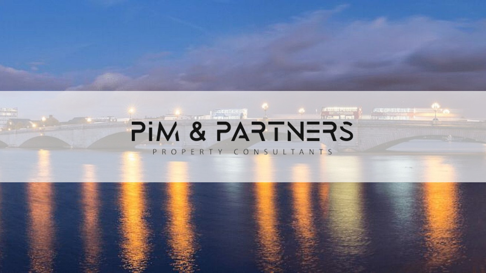 PIM & PARTNERS logo over the Thames at Putney Bridge at dusk